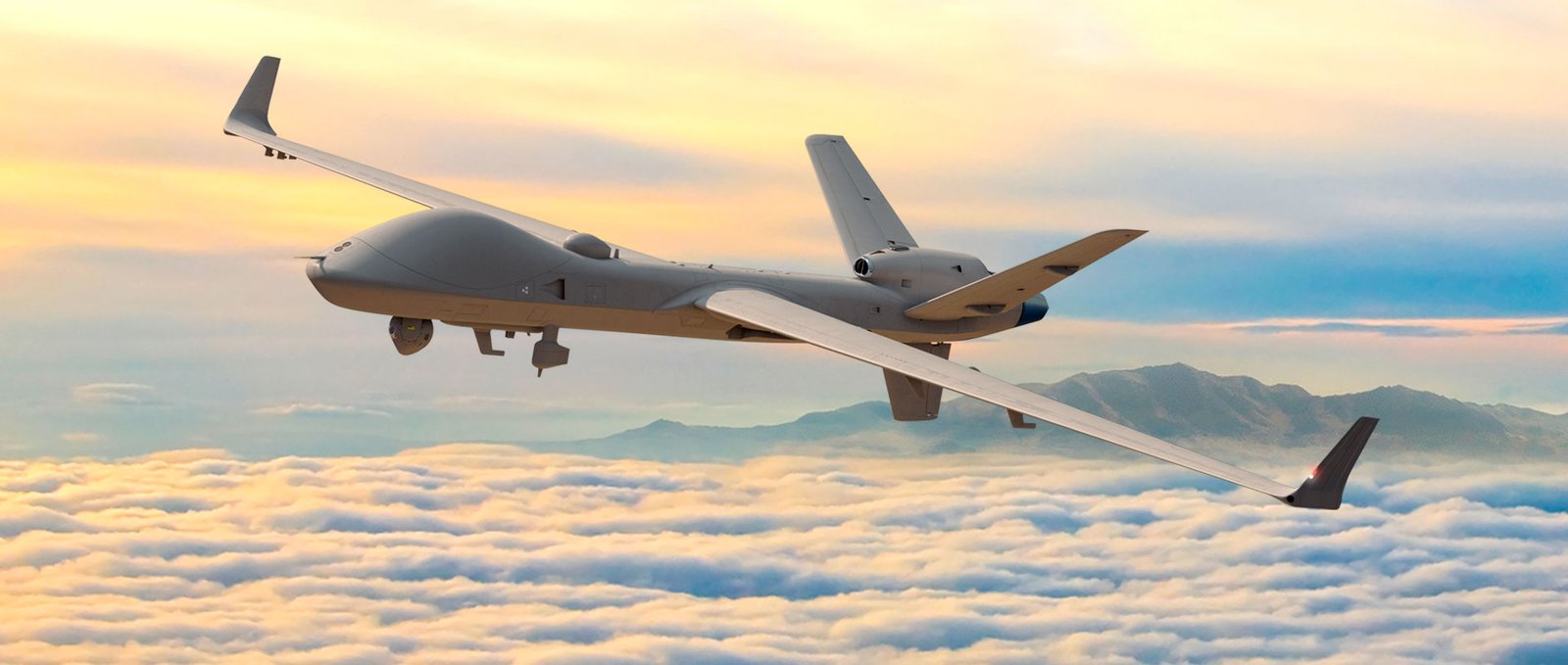 MQ-9B SkyGuardian MALE drone flying above cloud