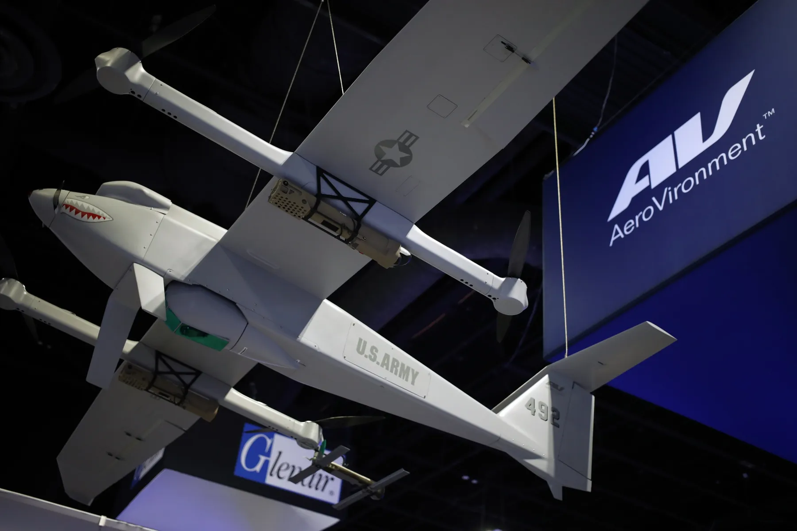 LOCUST 20kW high energy laser counter drone weapon system mounted on tactical military vehicle