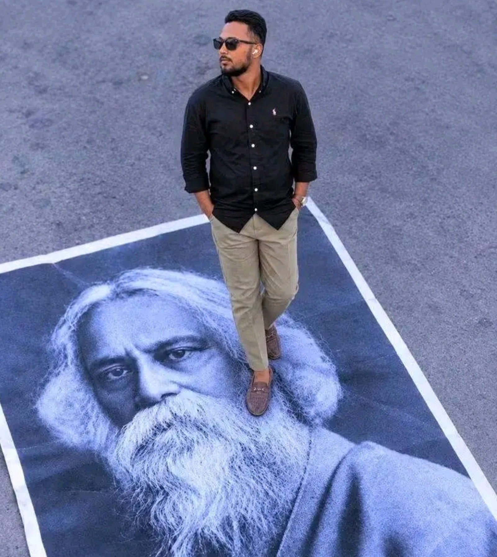 leader Hafizul allegedly trampling a portrait of Rabindranath Tagore in Bangladesh